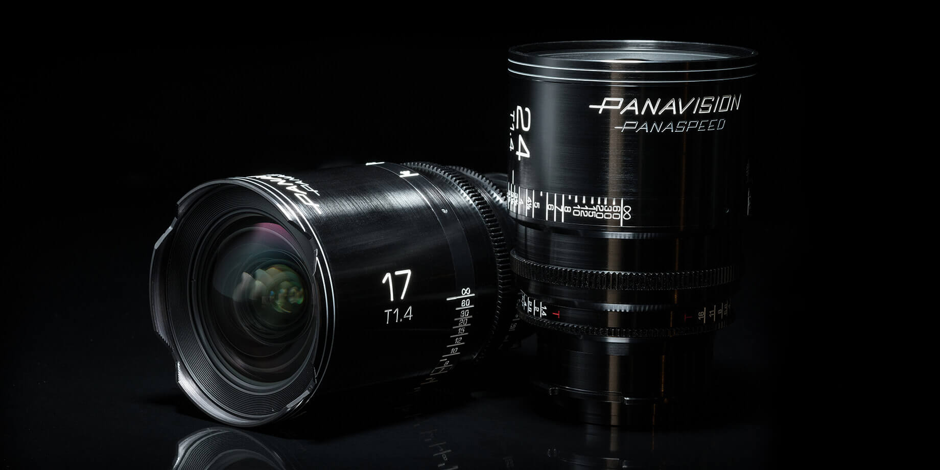 Two Panavision Panaspeed lenses on a black background